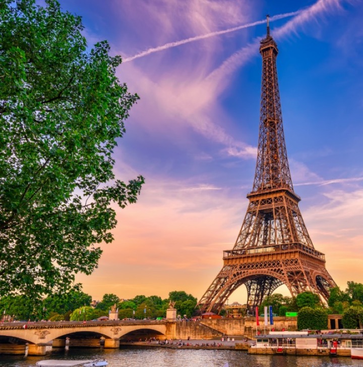 The Eiffel Tower over Paris at sunset