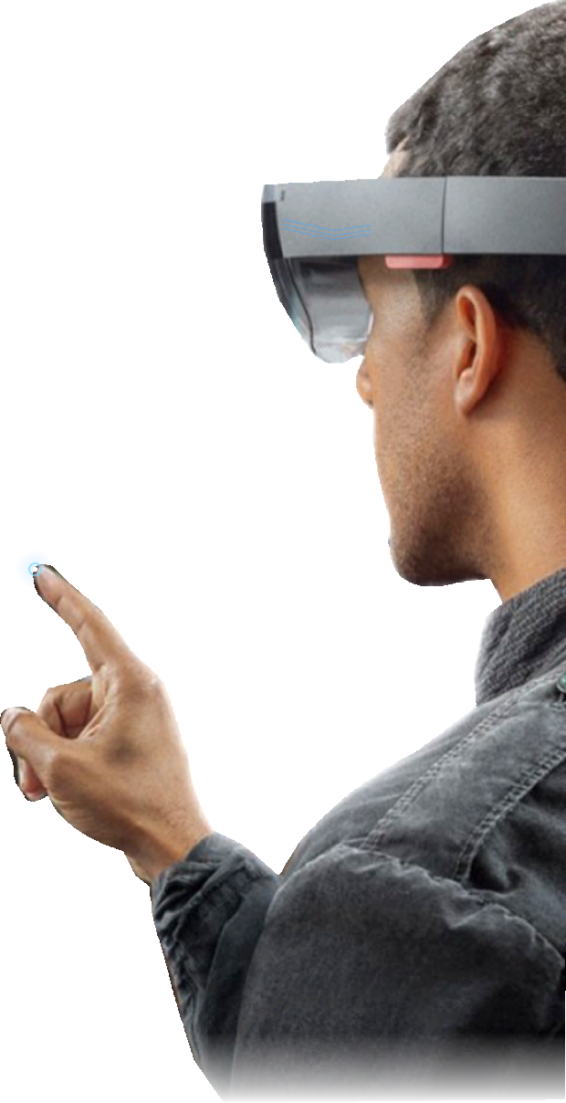 A learner in a mixed reality headset pointing at a 3D exhibit